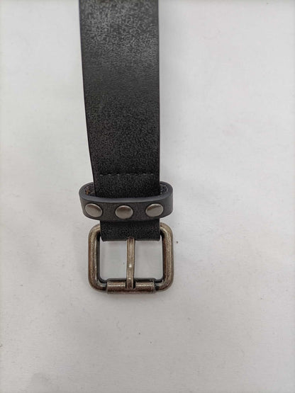 OTRAS.Cinturón negro tachuelas