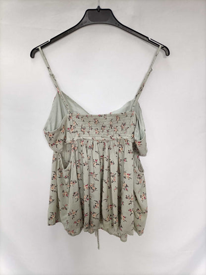 AMERICAN EAGLE.Top verde palo flores T.L