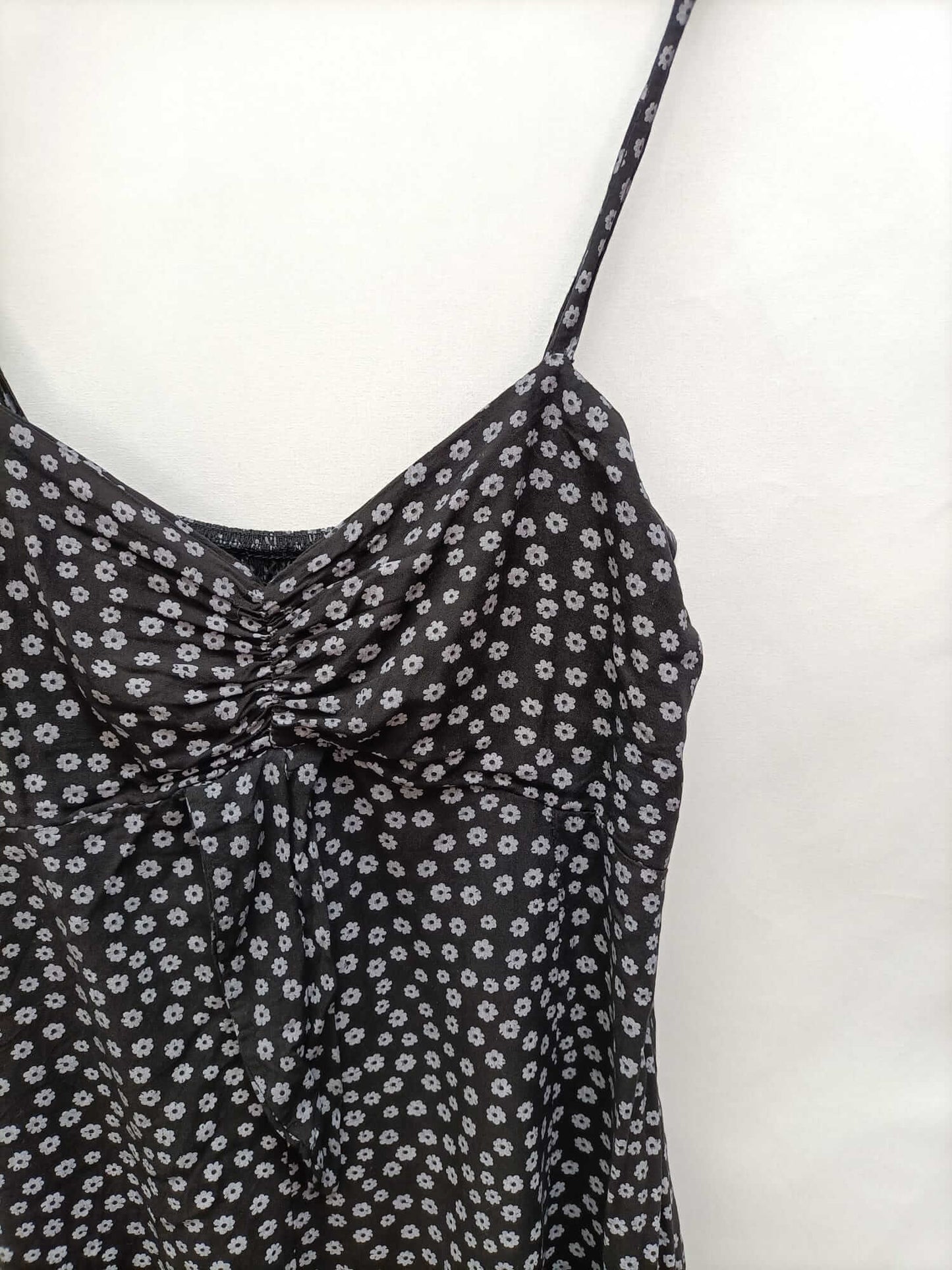 OTRAS.Mono negro flores T.s/m