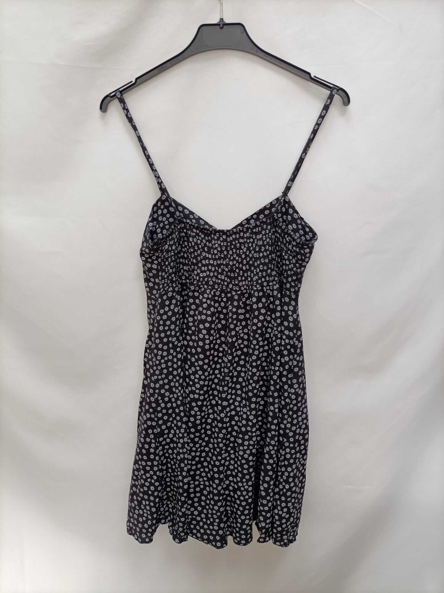 OTRAS.Mono negro flores T.s/m