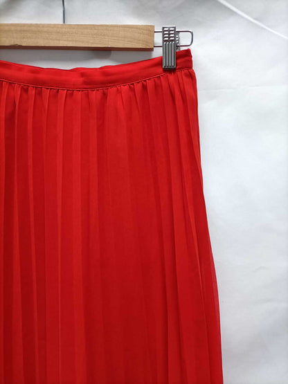 GINATRICOT. Two-tone midi skirt with pleats T.34