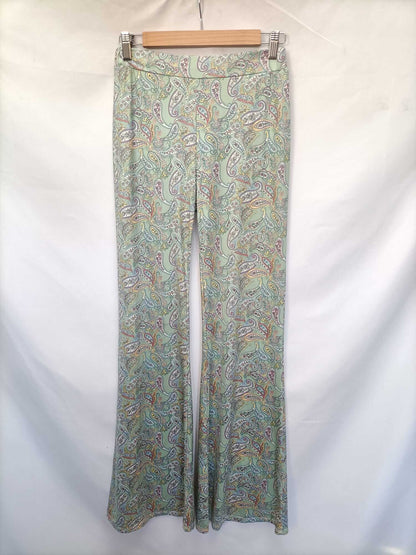 OTRAS.Pantalones campana elásticos T.s/m
