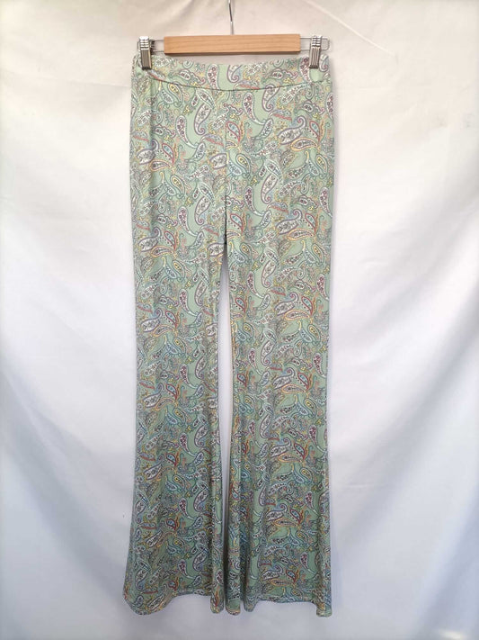 OTRAS.Pantalones campana elásticos T.s/m