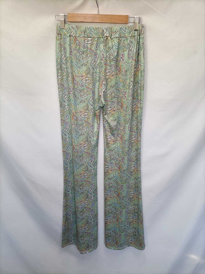 OTRAS.Pantalones campana elásticos T.s/m