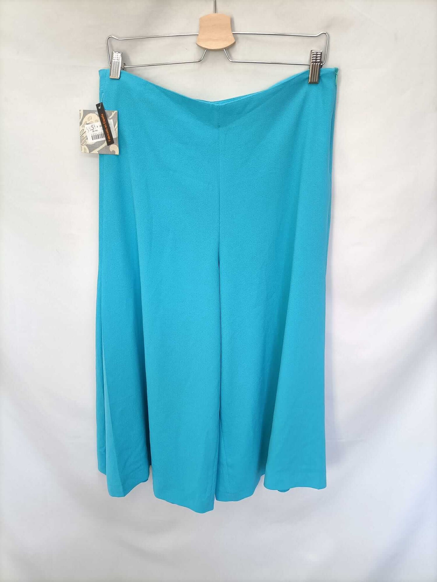 WOMAN DUO. Turquoise palazzo pants S.40