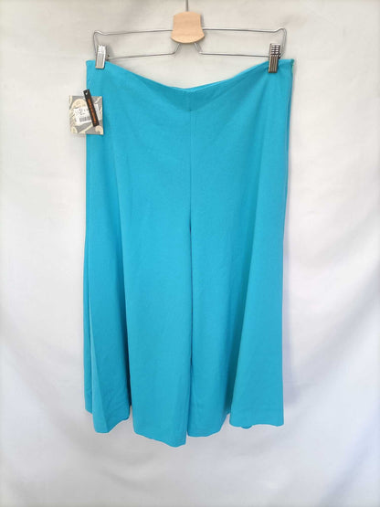 WOMAN DUO. Turquoise palazzo pants S.40