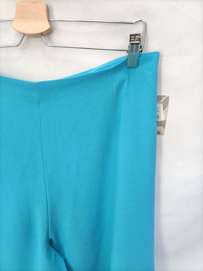 WOMAN DUO. Turquoise palazzo pants S.40
