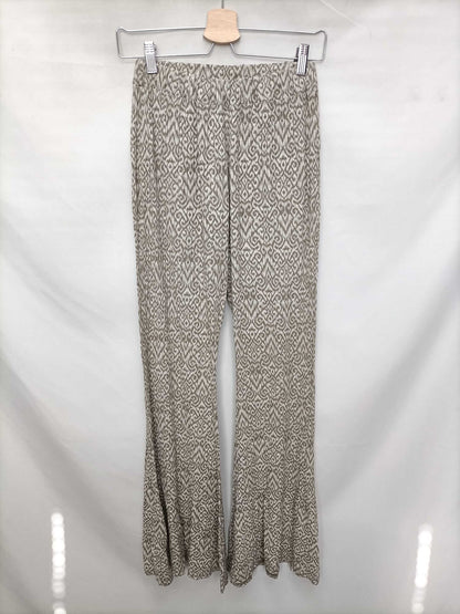 OTRAS.Pantalones elásticos campana beigesT.s/m