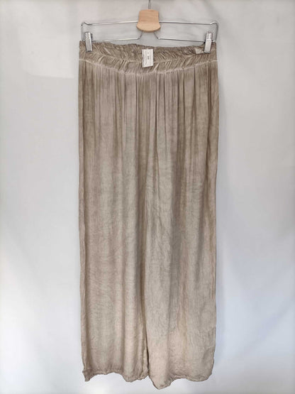 BY GIFT STORES.Worn beige palazzo pants Ts/m