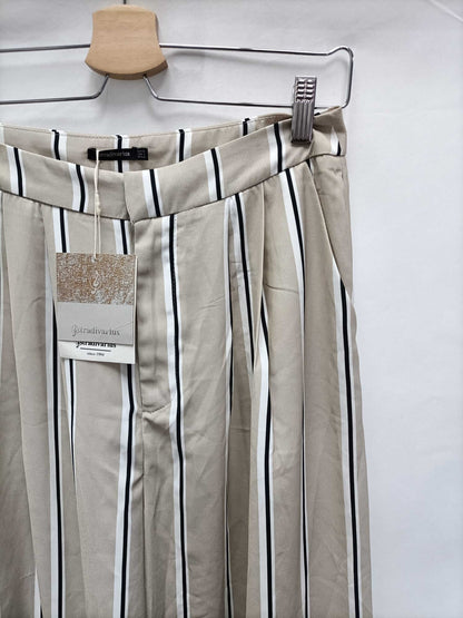STRADIVARIUS.Pantalones palazzo rayas T.38