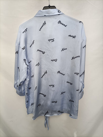 ELOGY.Blusa fluida rayas y letras T.XL