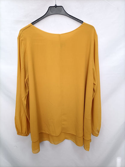 CARISAL.Blusa mostaza T.L