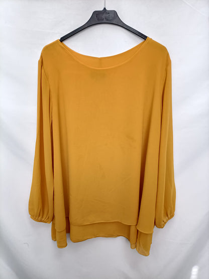 CARISAL.Blusa mostaza T.L