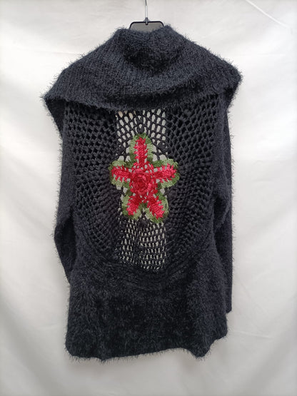 HOLD.Cárdigan negro pelito T.L