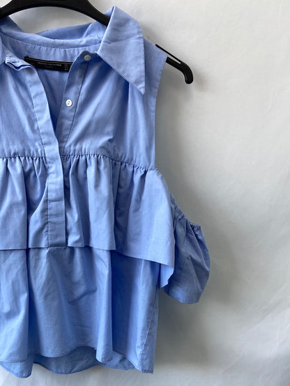 ZARA.Blusa azul volante T.S