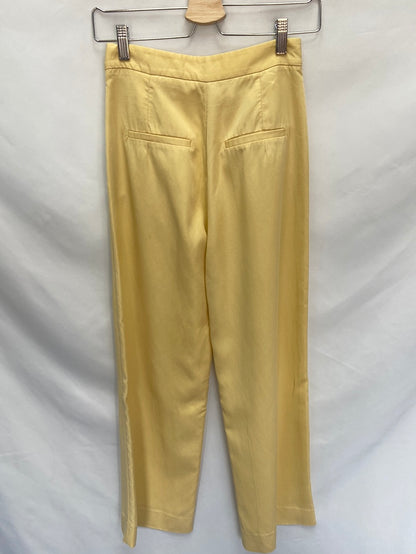 H&M.Pantalones fluidos amarillo pastel T.34