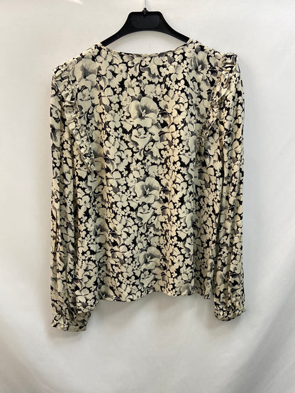 LES PETITES PARIS.Blusa flores volantes T.s