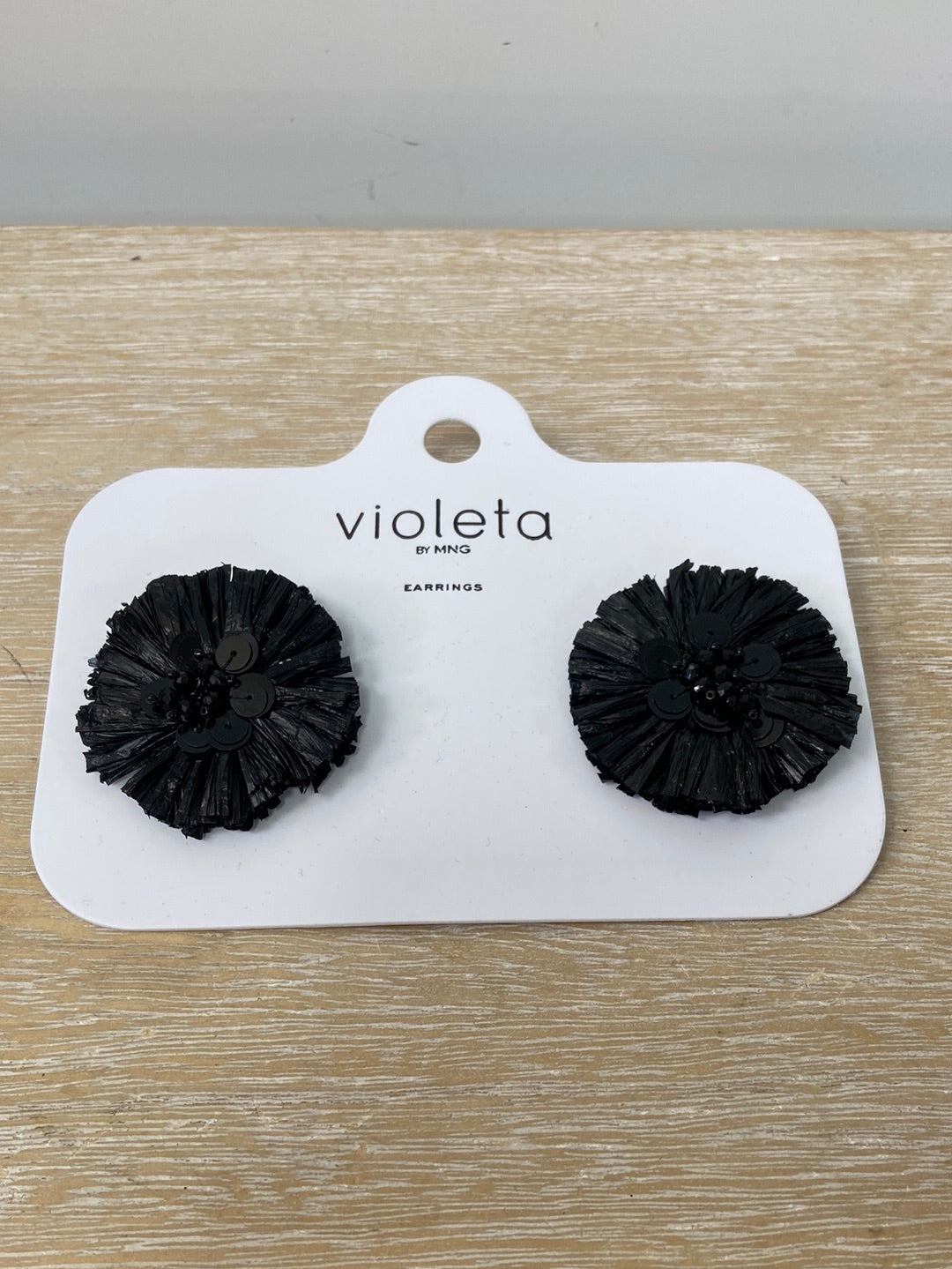 MANGO(VIOLETA).Pendientes flor flecos