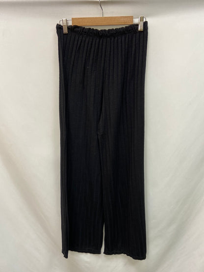 OTRAS.Pantalones canalé negros T.M/L