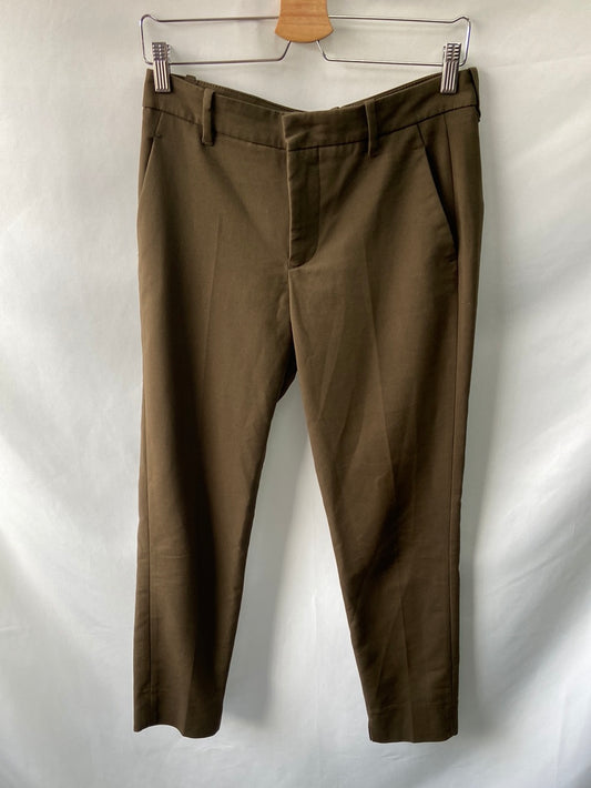 ZARA. Green pleated trousers