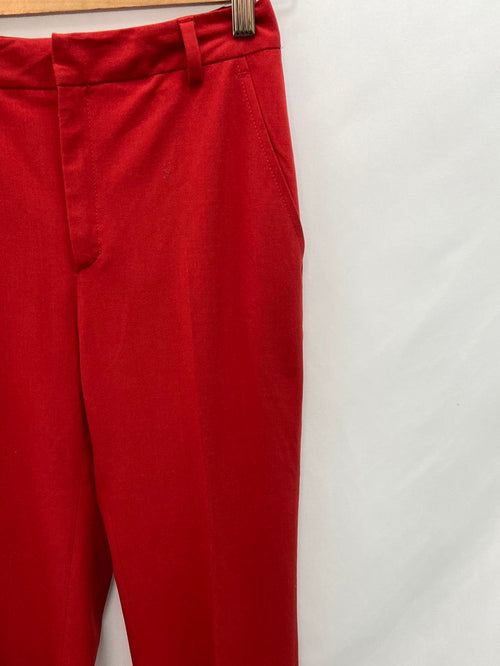 ZARA.Pantalones pinzas rojos T.36