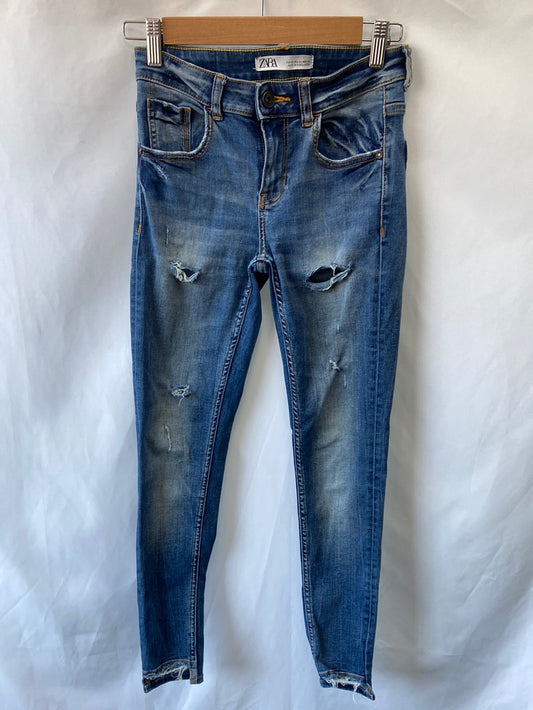 ZARA.Skinny jeans with ripped details S.36