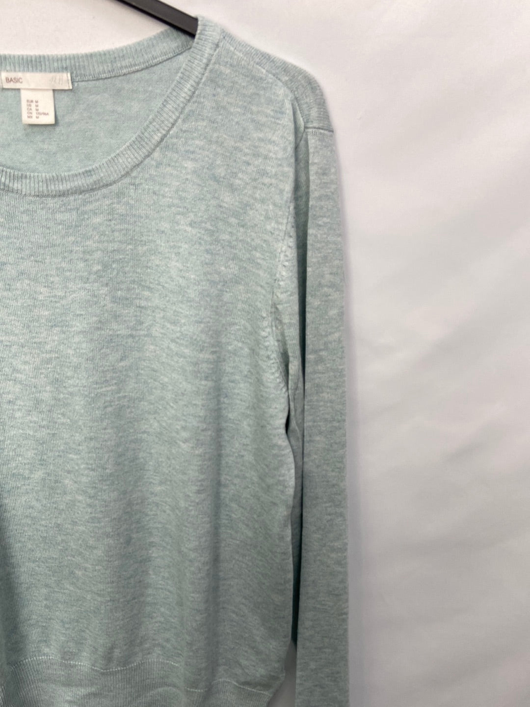 H&M.Jersey azul claro punto elástico T.M