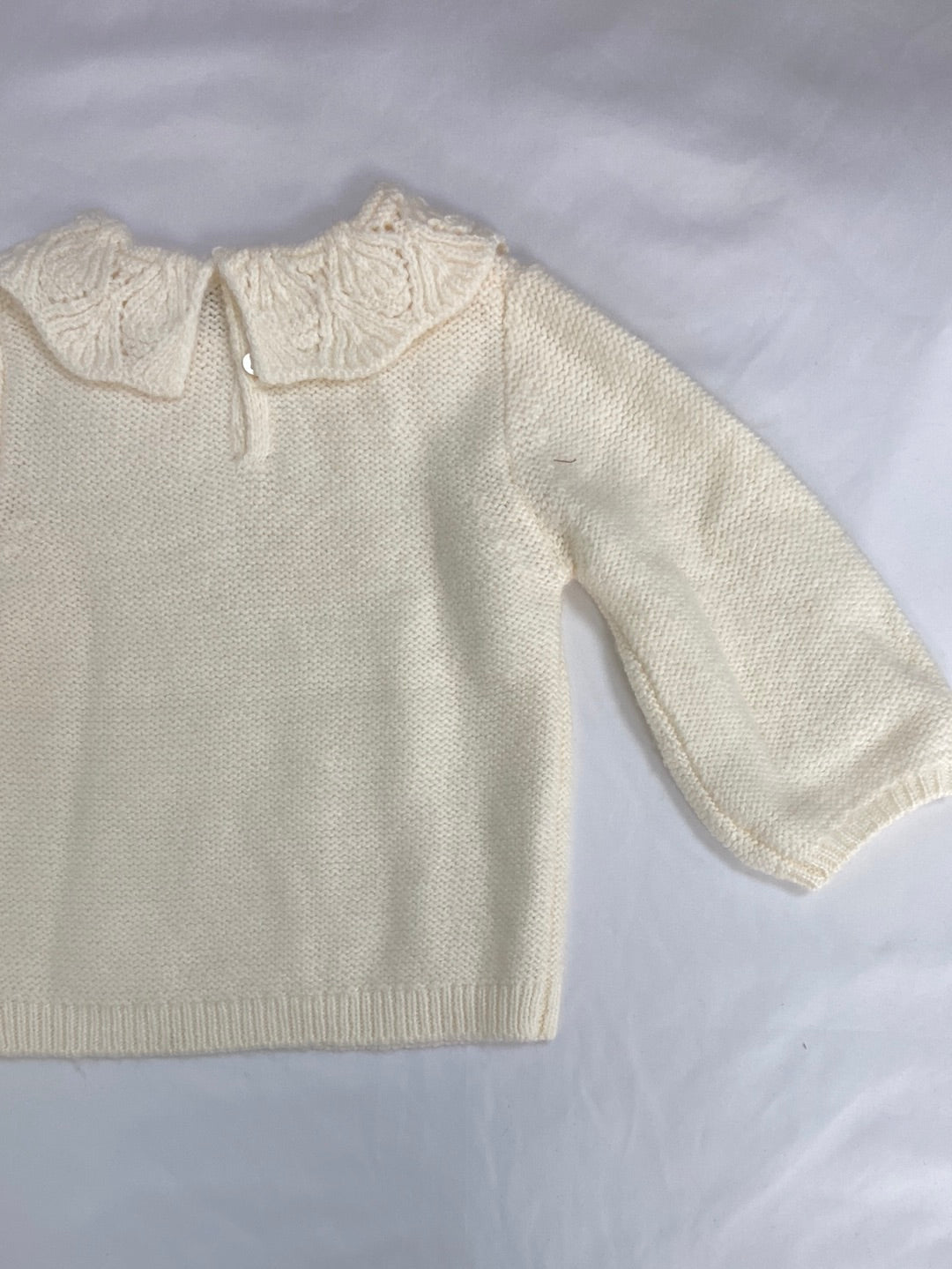 KIABI.Jersey beige cuello 9 meses