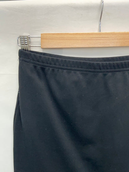 OTRAS.Falda corta negra elástica T.s