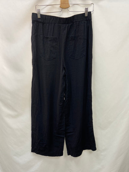MANGO. Relaxed long pants TM