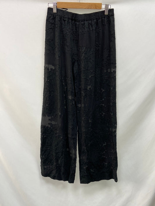 ZARA.Pantalones negros textura T.M