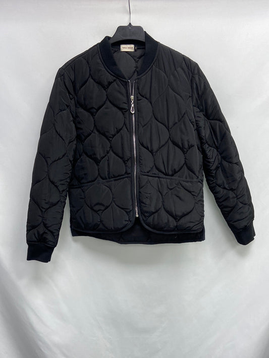 TERIA YABAR.Plumas negro ligero T.M