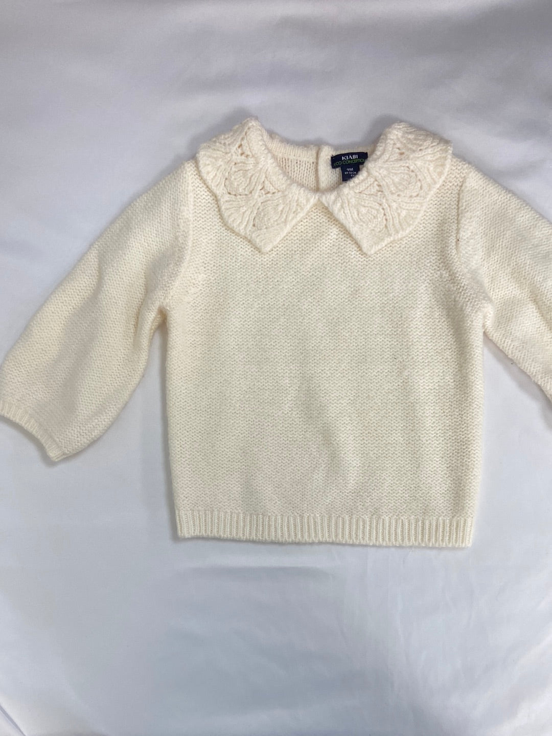 KIABI.Jersey beige cuello 9 meses