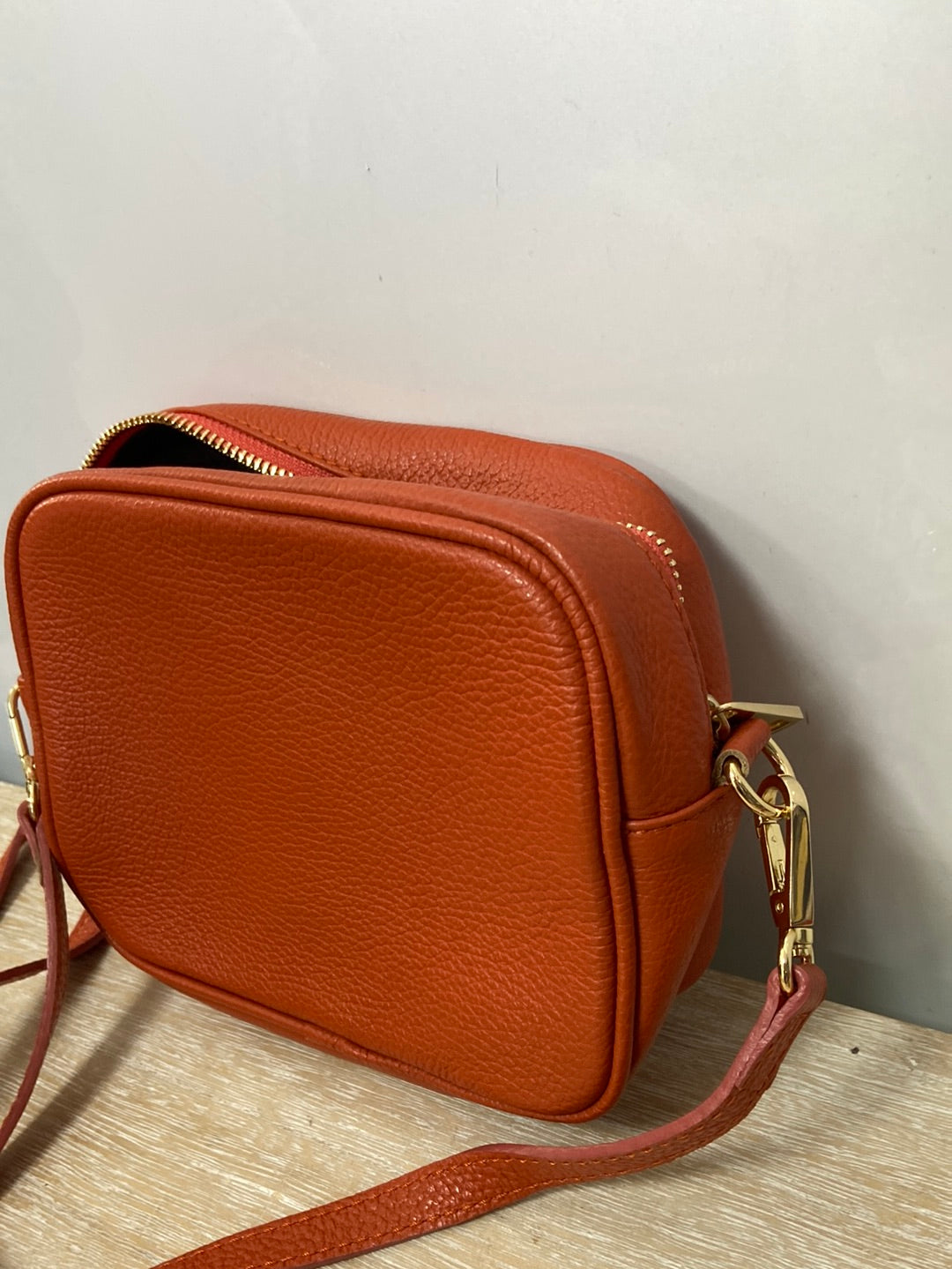 OTHERS. Orange leather bag