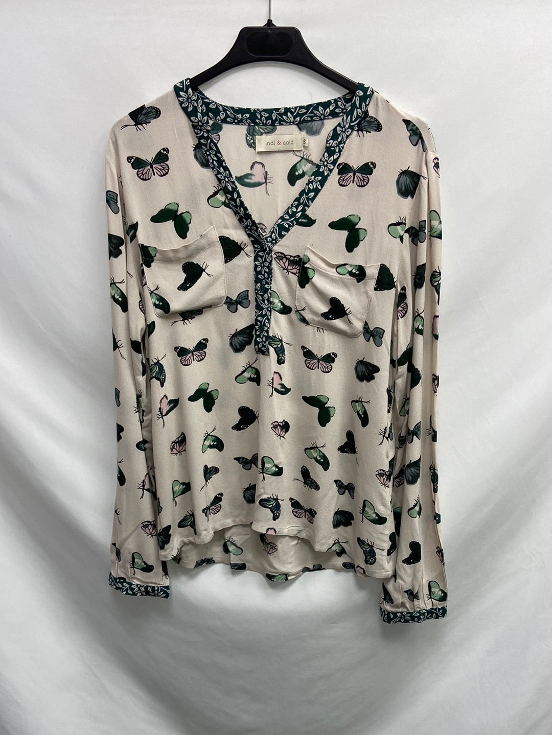 INDI&amp;COLD. Off-white blouse with green butterfly print.
