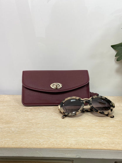 ZARA.Riñonera burdeos