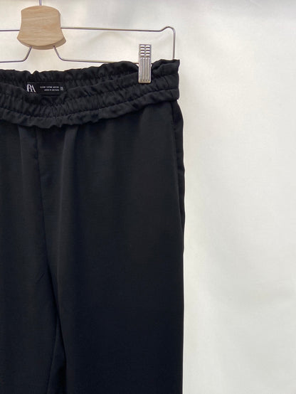 ZARA. Relaxed black trousers TM