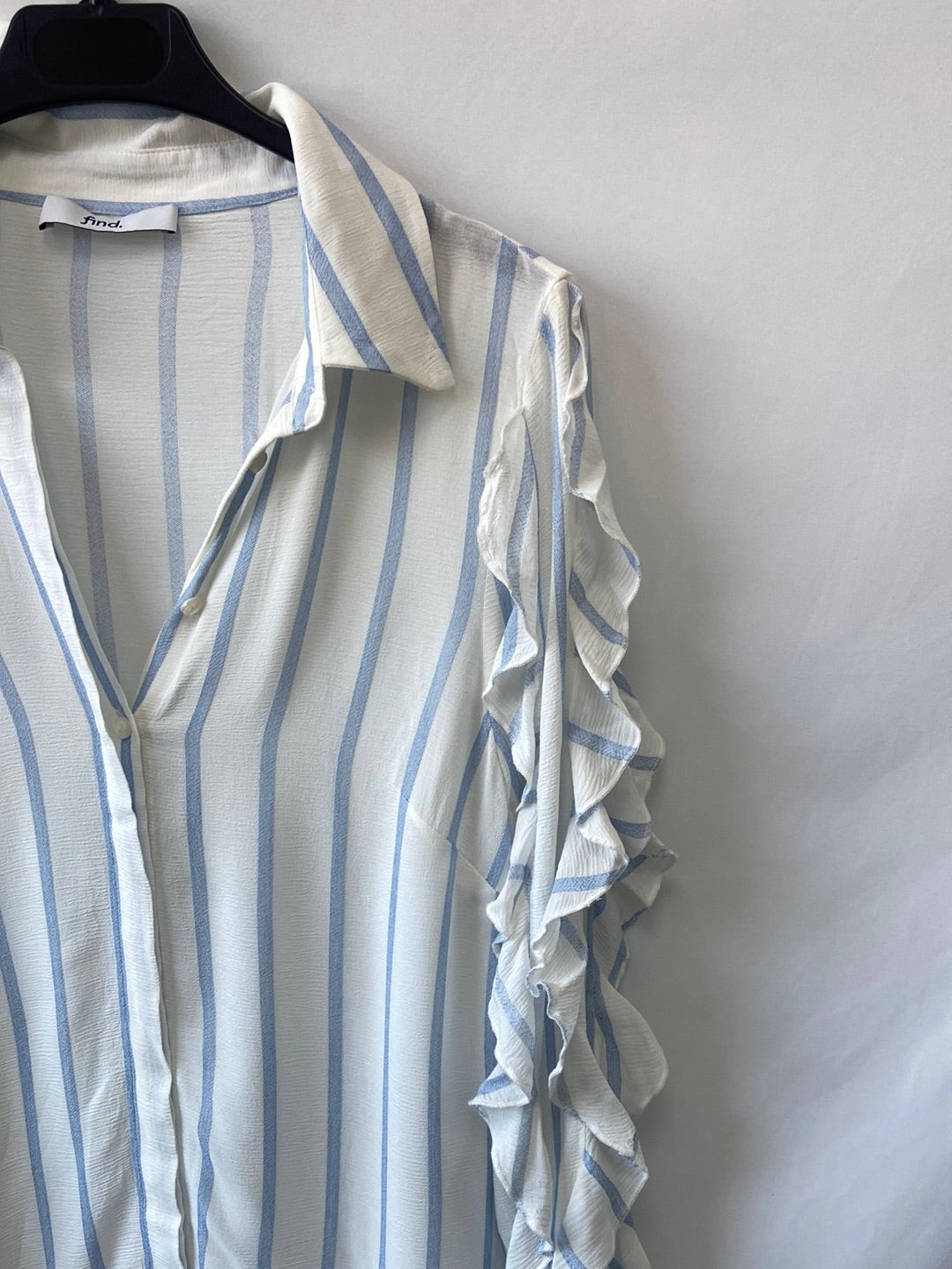 FIND.Blusa rayas volantes T.S