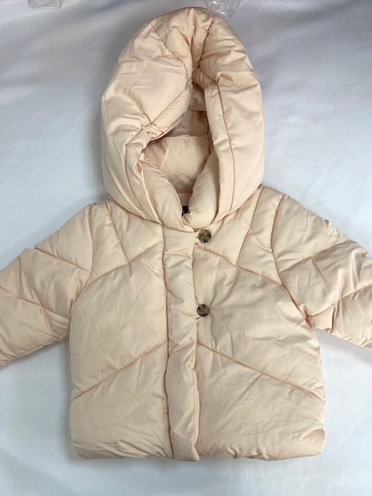 KIABI.Plumas beige rosita 9 meses