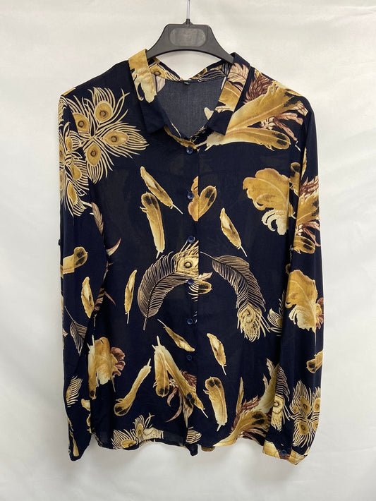 OTRAS.Blusa oversized plumas T.XL