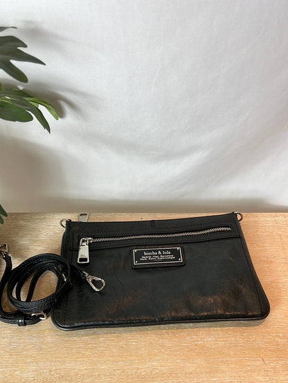 BIMBA Y LOLA. Bolso negro cremalleras