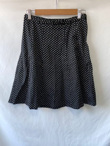 H&amp;M. Black polka dot skirt size 34