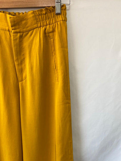 ZARA. Yellow Ts trousers
