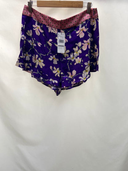 MANGO.Shorts morados Flores T.L