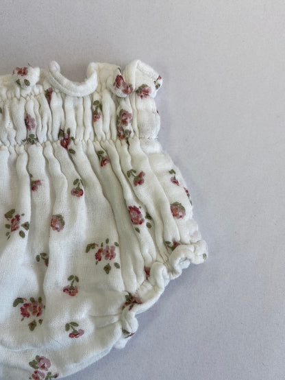 NICOLI. pololo blanca flores rosas T.0-3 meses