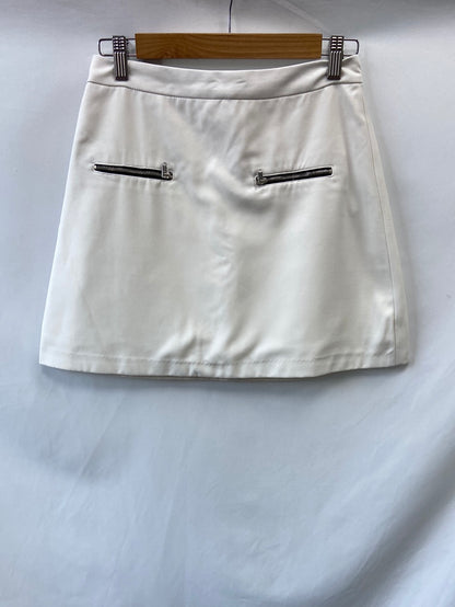 ZARA.Falda corta blanca T.S