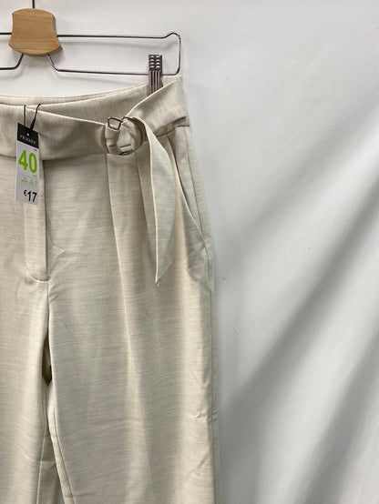 PRIMARK.Pantalones grises arreglados T.40