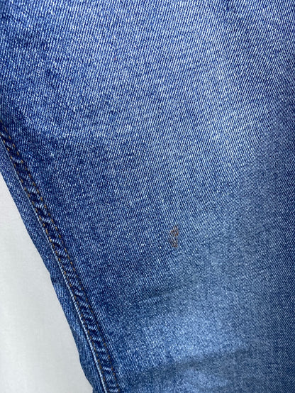 H&M.Pantalones denim acampanados T.38 (Tara)