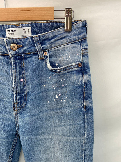 BERSHKA.Pantalones pintura T.36