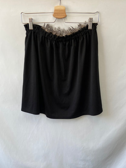 CON J Y G.Top plumas abierto T.m